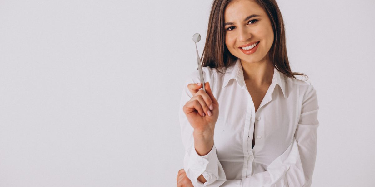 female-dentist-with-dentistry-tools-isolated-scaled.jpg